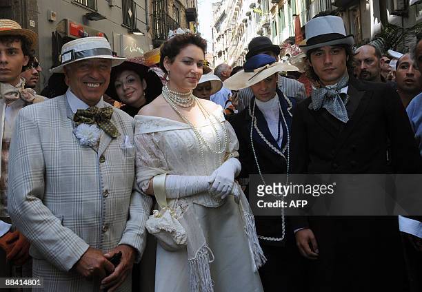An actress dressed like Queen Margherita of Savoy arrives for a ceremony to celebrate the 120th anniversary of the pizza Margherita on June 11, 2009...
