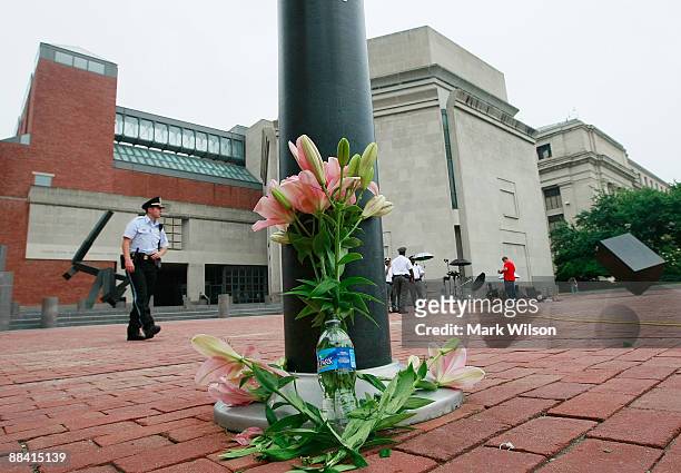 Flowers are placed in front of the Holocaust Museum June 11, 2009 where a security guard was killed Wednesday in Washington, DC. James W. Von Brunn,...