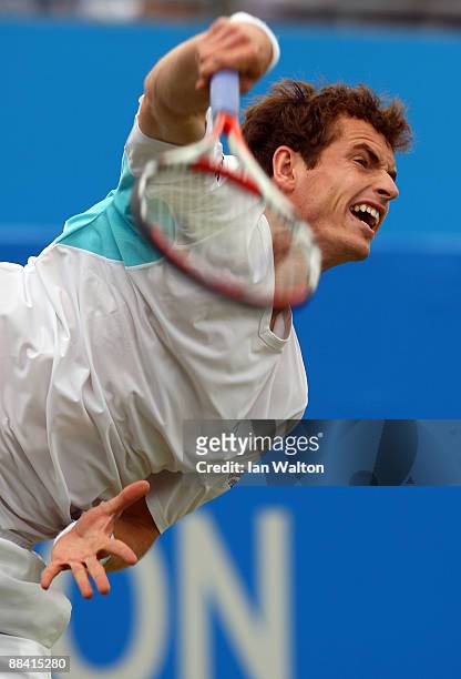 Andy Murray of Great Britain serves during the men's third round match against Guillermo Garcia-Lopez of Spain during Day 3 of the the AEGON...