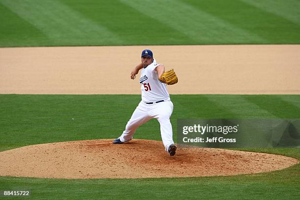 Jonathan Broxton of the Los Angeles Dodgers throws a pitch against the Philadelphia Phillies at Dodger Stadium on June 6, 2009 in Los Angeles,...