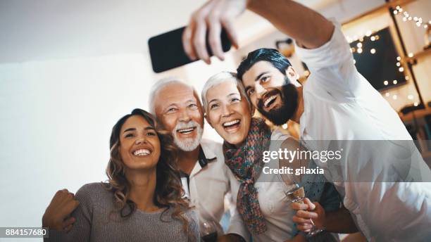 christmas selfie. - adult laughing christmas stock pictures, royalty-free photos & images