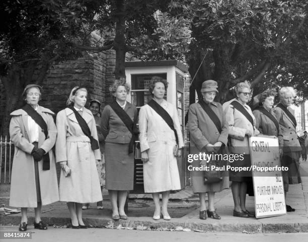 Members of the Black Sash movement hold a demonstration outside the South African parliament in Cape Town, to protest against the General Law...