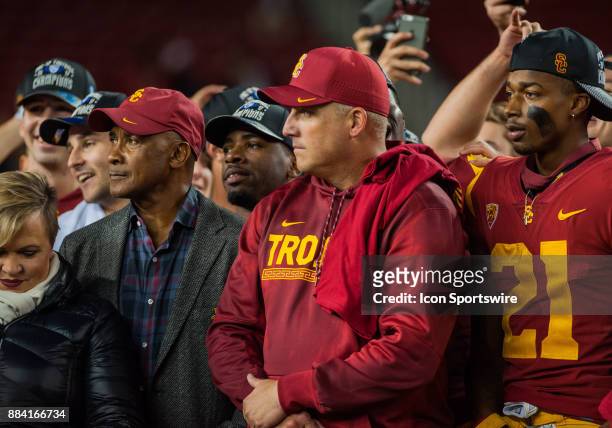 Trojans Head Coach Clay Helton enjoys his teams 31-27 win after the Pac-12 Championship game between the Stanford Cardinal and the USC Trojans on...