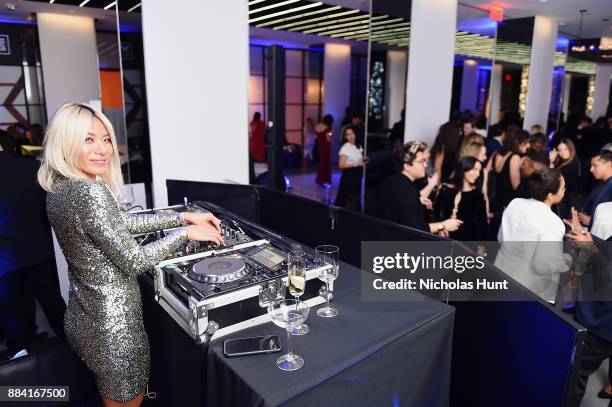 May Kawok attends the 2017 amfAR generationCURE Holiday Party on December 1, 2017 in New York City.