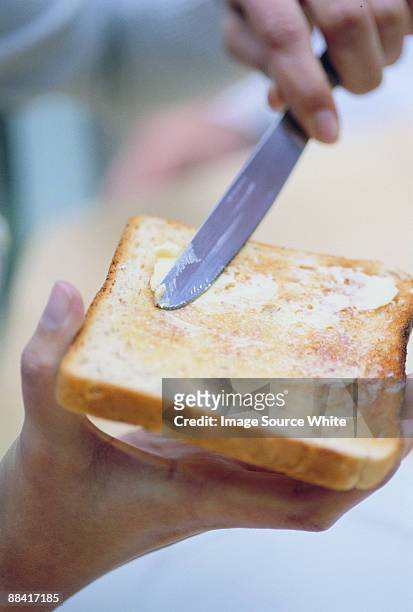 toast and butter - buttering stock pictures, royalty-free photos & images