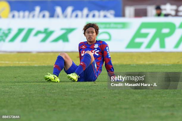 Yuki Horigome of Ventforet Kofu shows dejection after the relegation to the J2 despite his side's 1-0 victory in the J.League J1 match between...