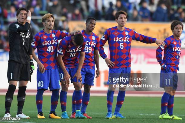 Ventforet Kofu players show dejection after the relegation to the J2 despite their 1-0 victory in the J.League J1 match between Ventforet Kofu and...