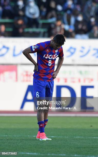 Eder Lima of Ventforet Kofu shows dejection after the relegation to the J2 despite his side's 1-0 victory in the J.League J1 match between Ventforet...