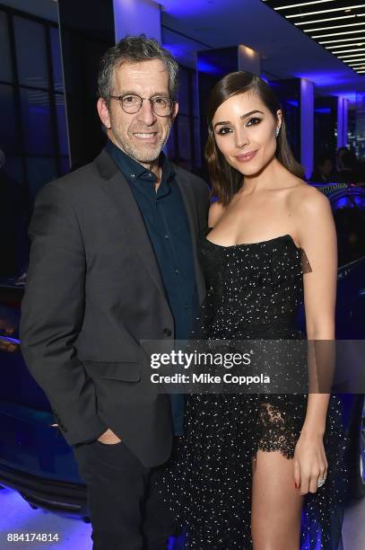 Fashion Designer Kenneth Cole and actress/model Oliva Culpo attend the 2017 amfAR generationCURE Holiday Party on December 1, 2017 in New York City.