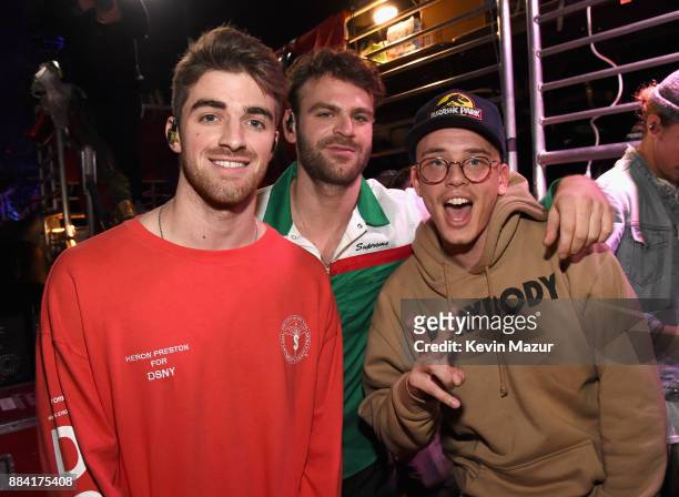 Andrew Taggart and Alex Pall of The Chainsmokers and Logic pose backstage during 102.7 KIIS FM's Jingle Ball 2017 presented by Capital One at The...
