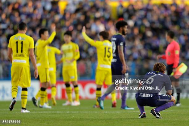 Toshihiro Aoyama of Sanfrecce Hiroshima shows dejection after his side's 0-1 defeat in the J.League J1 match between Kashiwa Reysol and Sanfrecce...