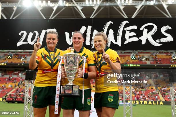 Ruan Sims of the Jillaroos, Stephanie Hancock of the Jillaroos and Renae Kunst of the Jillaroos pose with the trophy after winning the 2017 Rugby...