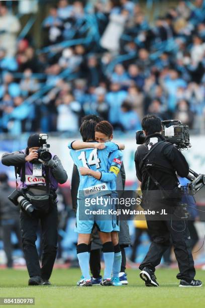 Kengo Nakamura and Yu Kobayashi of Kawasaki Frontale celebrate their 5-0 victory and the J.Leaague Chmpions afetr the J.League J1 match between...