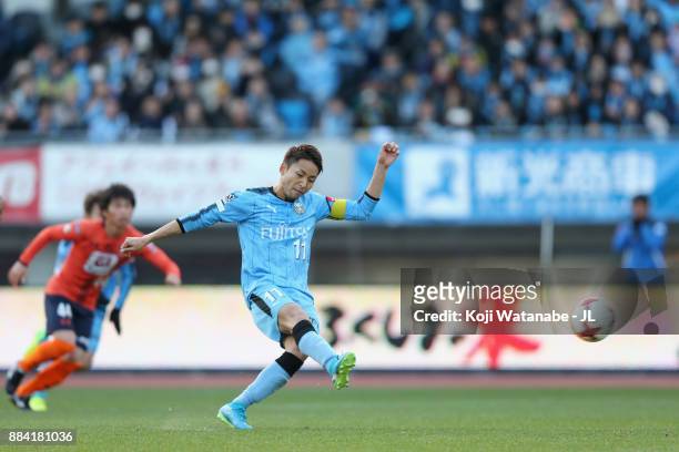 Yu Kobayashi of Kawasaki Frontale converts the penalty to score his side's fourth and his hat trick goal during the J.League J1 match between...