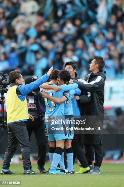 Kengo Nakamura and Yu Kobayashi of Kawasaki Frontale celebrate their 5-0 victory and the J.Leaague Chmpions afetr the J.League J1 match between...