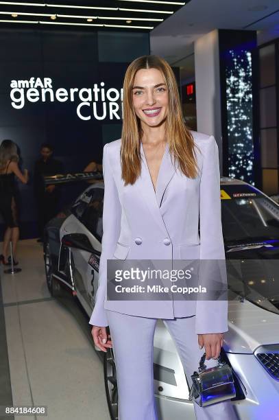 Model Alina Baikova attends the 2017 amfAR generationCURE Holiday Party on December 1, 2017 in New York City.