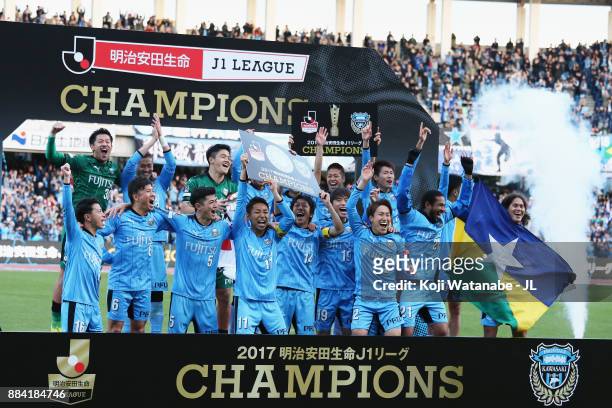 Kawasaki Frontale players celebrate the J.League Champions at the award ceremony after the J.League J1 match between Kawasaki Frontale and Omiya...