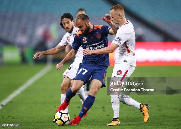 Ivan Franjic of the Roar competes with the Wanderers defence during the round nine A-League match between the Western Sydney Wanderers and the...