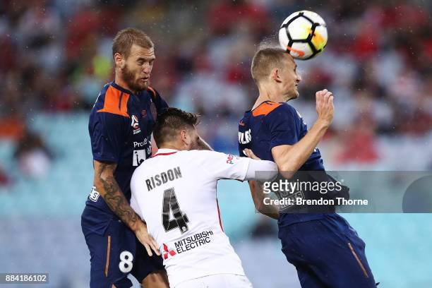 Daniel Bowles of the Roar heads the ball during the round nine A-League match between the Western Sydney Wanderers and the Brisbane Roar at ANZ...