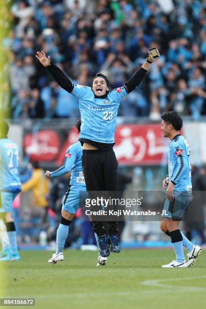 Eduardo of Kawasaki Frontale celebartes his side's 5-0 victory and the J.League Champions after the J.League J1 match between Kawasaki Frontale and...