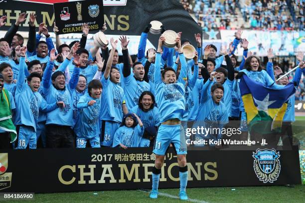 Yu Kobayashi and Kawasaki Frontale players celebate the J.League Champions at the award ceremony after the J.League J1 match between Kawasaki...