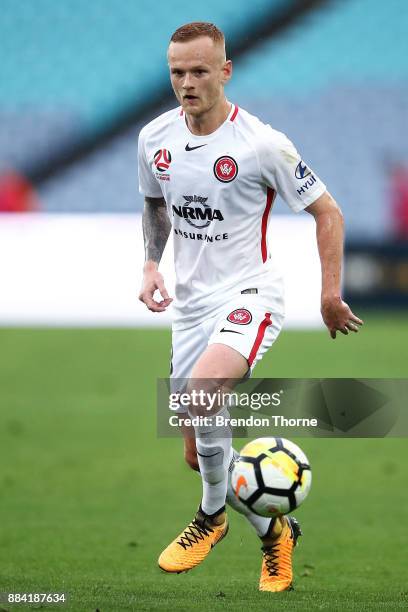 Jack Clisby of the Wanderers passes the ball to a team mate during the round nine A-League match between the Western Sydney Wanderers and the...