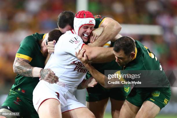 Chris Hill of England is tackled during the 2017 Rugby League World Cup Final between the Australian Kangaroos and England at Suncorp Stadium on...