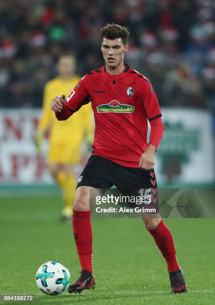 Pascal Stenzel of Freiburg controls the ball during the Bundesliga match between Sport-Club Freiburg and Hamburger SV at Schwarzwald-Stadion on...