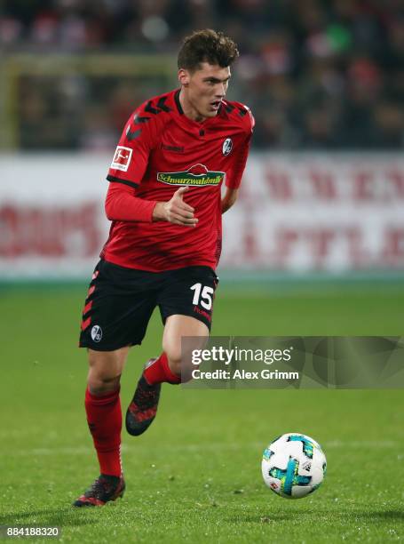 Pascal Stenzel of Freiburg controls the ball during the Bundesliga match between Sport-Club Freiburg and Hamburger SV at Schwarzwald-Stadion on...