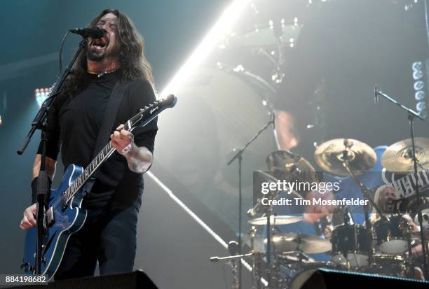 Dave Grohl and Taylor Hawkins of Foo Fighters perform in support of the band's "Concrete and Gold" release at Save Mart Center on December 1, 2017 in...