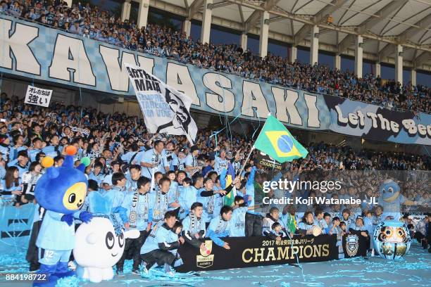 Kawasaki Frontale players celebrate the J.League Champions with supporters after the J.League J1 match between Kawasaki Frontale and Omiya Ardija at...