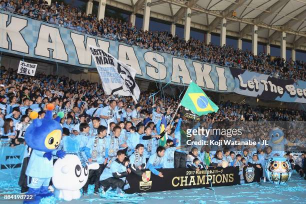 Kawasaki Frontale players celebrate the J.League Champions with supporters after the J.League J1 match between Kawasaki Frontale and Omiya Ardija at...