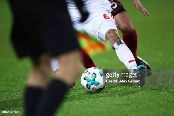 Douglas Santos of Hamburg is challenged by Pascal Stenzel of Freiburg during the Bundesliga match between Sport-Club Freiburg and Hamburger SV at...