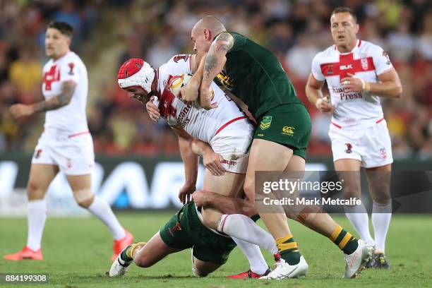 Chris Hill of England is tackled during the 2017 Rugby League World Cup Final between the Australian Kangaroos and England at Suncorp Stadium on...