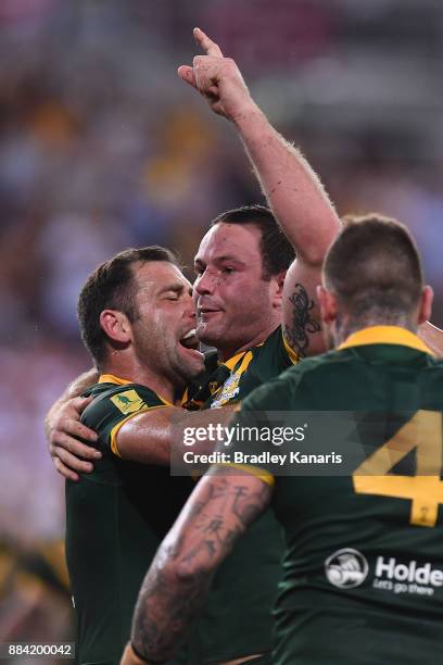 Boyd Cordner of the Kangaroos celebrates scoring a try during the 2017 Rugby League World Cup Final between the Australian Kangaroos and England at...