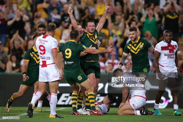 Boyd Cordner of the Kangaroos celebrates scoring a try during the 2017 Rugby League World Cup Final between the Australian Kangaroos and England at...