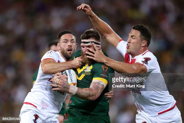 Josh McGuire of the Kangaroos is tackled during the 2017 Rugby League World Cup Final between the Australian Kangaroos and England at Suncorp Stadium...