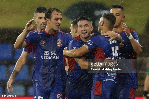 Jets players celebrate a goal by Andrew Nabbout during the round nine A-League match between the Newcastle Jets and Melbourne City at McDonald Jones...