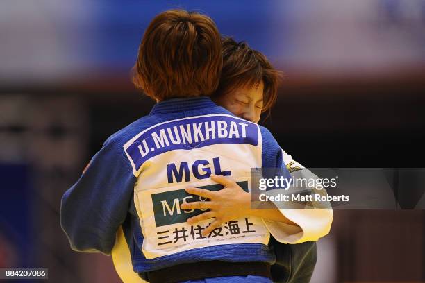 Ami Kondo of Japan celebrates victory in the Women's 48kg Final against Urantsetseg Munkhbat of Mongolia during day one of the Judo Grand Slam Tokyo...