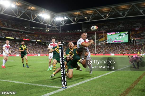 Ryan Hall of England is tackled over the sideline during the 2017 Rugby League World Cup Final between the Australian Kangaroos and England at...