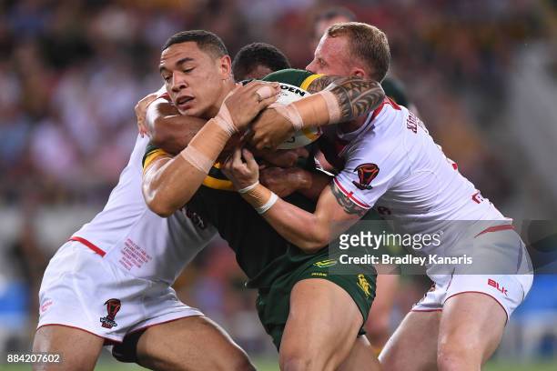 Tyson Frizell of the Kangaroos is tackled during the 2017 Rugby League World Cup Final between the Australian Kangaroos and England at Suncorp...