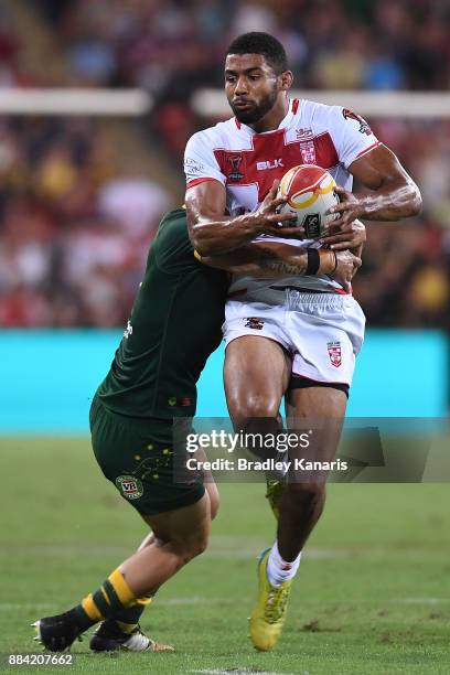 Kallum Watkins of England is tackled during the 2017 Rugby League World Cup Final between the Australian Kangaroos and England at Suncorp Stadium on...