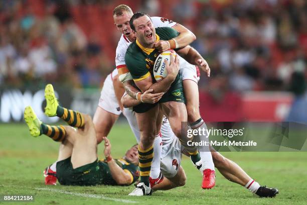 Boyd Cordner of Australia is tackled during the 2017 Rugby League World Cup Final between the Australian Kangaroos and England at Suncorp Stadium on...