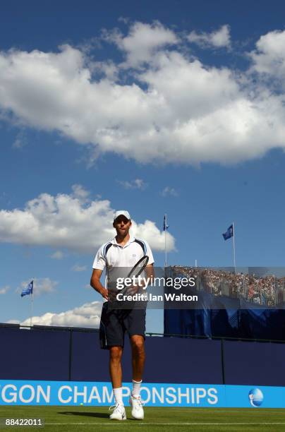 Ivo Karlovic of Croatia prepares to play during the men's third round match against Nicolas Mahut of France during Day 3 of the the AEGON...