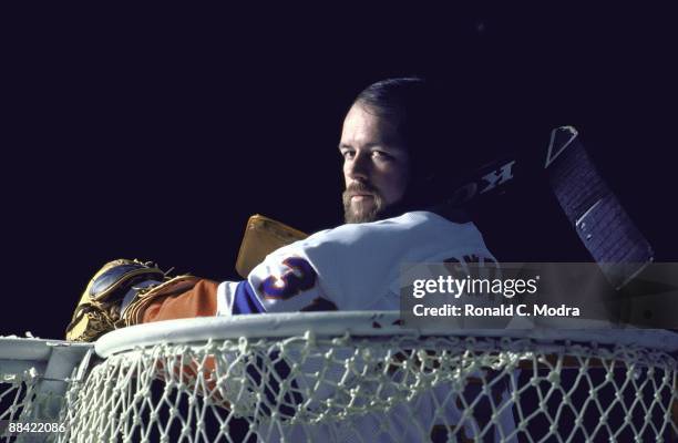 Portrait of New York Islanders goalie Billy Smith on ice holding stick behind net at Nassau Coliseum. Uniondale, NY 5/1/1982 CREDIT: Ronald C. Mondra