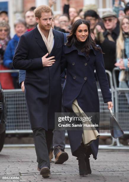 Prince Harry and Meghan Markle go on a walk about at Nottingham Contemporary on December 1, 2017 in Nottingham, England. Prince Harry and Meghan...