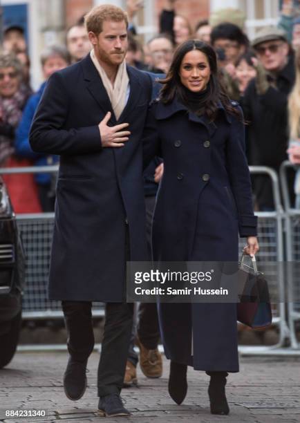 Prince Harry and Meghan Markle go on a walk about at Nottingham Contemporary on December 1, 2017 in Nottingham, England. Prince Harry and Meghan...