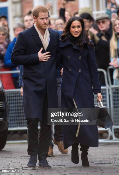 Prince Harry and Meghan Markle go on a walk about at Nottingham Contemporary on December 1, 2017 in Nottingham, England. Prince Harry and Meghan...