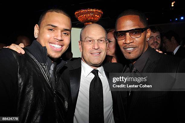 Singer Chris Brown, Chairrman and CEO RCA Jive label group Barry Weiss, and actor Jamie Foxx attend the 2009 GRAMMY Salute To Industry Icons honoring...