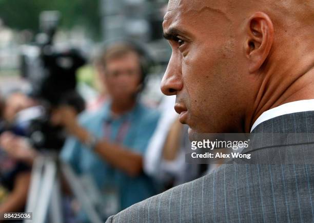 Washington, DC, Mayor Adrian Fenty listens to questions during a news conference on the shooting at the U.S. Holocaust Memorial Museum June 11, 2009...